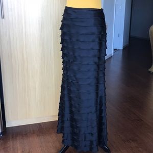 ECU Trina Turk silk tiered long skirt in black.